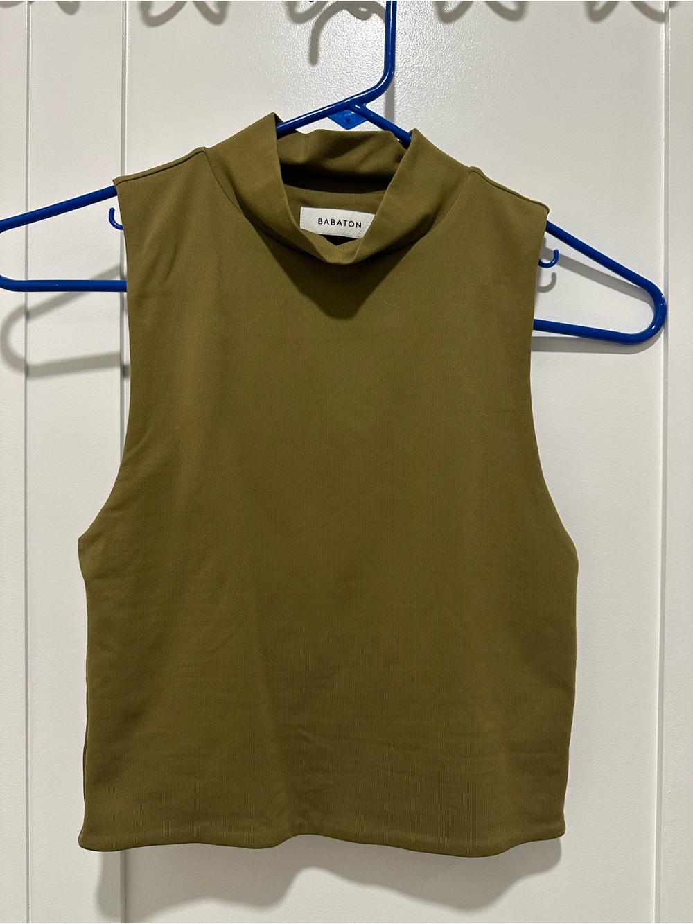 Aritzia Babaton mock neck tank in olive green.